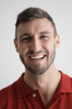 A headshot of a very happy customer.
